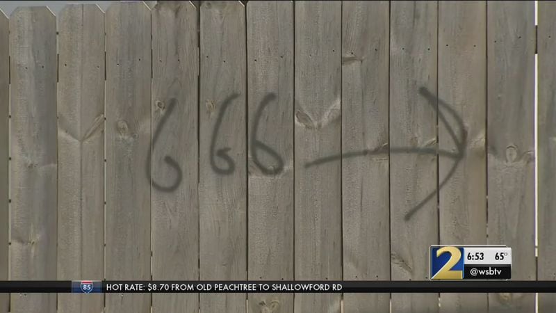Police: Retaliation was motive for satanic symbols spray-painted in neighborhood