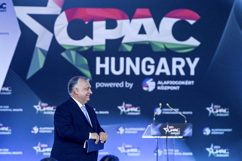 Hungarian Prime Minister Viktor Orban arrives at the third Hungarian edition of the Conservative Political Action Conference, CPAC Hungary, in Budapest, Hungary, Thursday, April 25, 2024. (Szilard Koszticsak/MTI via AP)