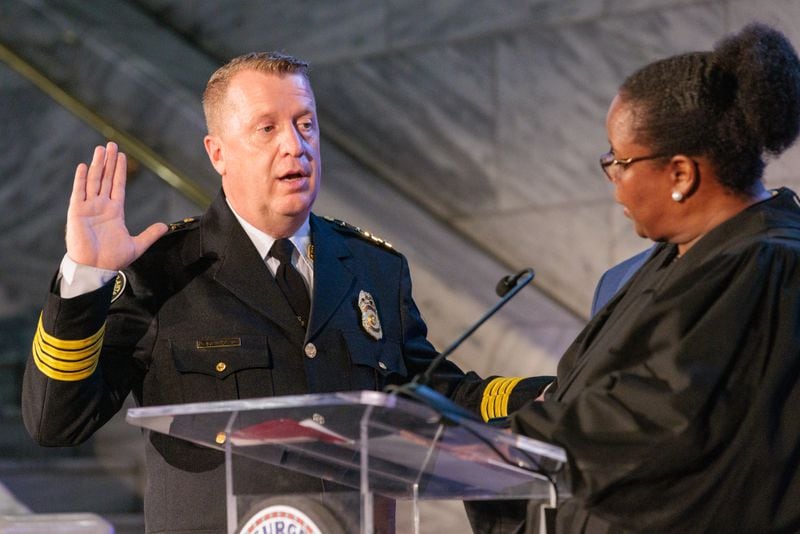 New Atlanta police Chief Darin Schierbaum is sworn in by Judge Crystal Gaines at Atlanta City Hall on Wednesday, Dec. 7. He is the city’s 26th chief of police. (Arvin Temkar / arvin.temkar@ajc.com)