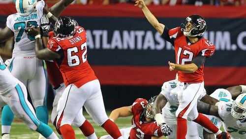 Curtis Compton Falcons quarterback Sean Renfree gets off a pass during the second half of an NFL exhibition game against Miami on Friday, August 8, 2014, in Atlanta. The team elected to keep three quarterbacks.