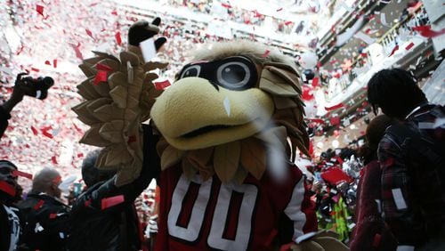 January 27, 2017, Atlanta, Georgia - Falcons mascot Freddie Falcon celebrates with a fan at the Atlanta Falcons pep rally held by Mayor Kasim Reed at City hall in Atlanta, Georgia, on Friday, January 27, 2017. (HENRY TAYLOR / HENRY.TAYLOR@AJC.COM)