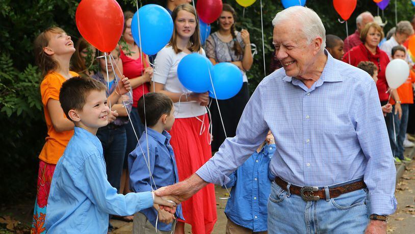 This AJC file photo shows Jimmy Carter at his surprise 90th birthday party in Plains. The former president's 94th birthday is Monday, Oct. 1 and you can celebrate it at his namesake Atlanta library and museum.   CURTIS COMPTON / CCOMPTON@AJC.COM