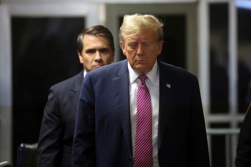 Former President Donald Trump, followed by attorney Todd Blanche, exits the courtroom following proceedings in his trial, Friday, April 19, 2024, at Manhattan Criminal Court in New York. (Spencer Platt/Pool Photo via AP)