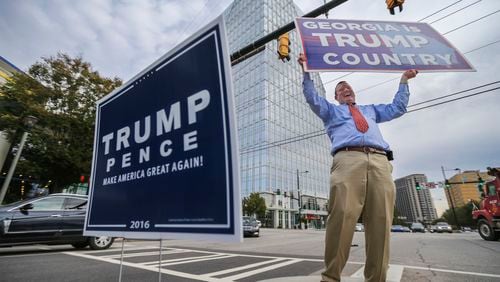 The Justice Department has sought records from Brad Carver, an attorney and Republican activist shown campaigning in November 2020. He was among 16 members of a fake slate of electors as part of Donald Trump's effort to overturn the 2020 presidential election. JOHN SPINK /JSPINK@AJC.COM