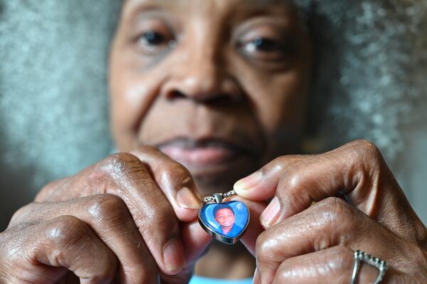 June 8, 2021 Atlanta - Glenda Mack holds a necklace that includes a photo of her grandson David. The 12-year-old was found shot to death in February 2021, not far from their southwest Atlanta home.(Hyosub Shin / Hyosub.Shin@ajc.com)