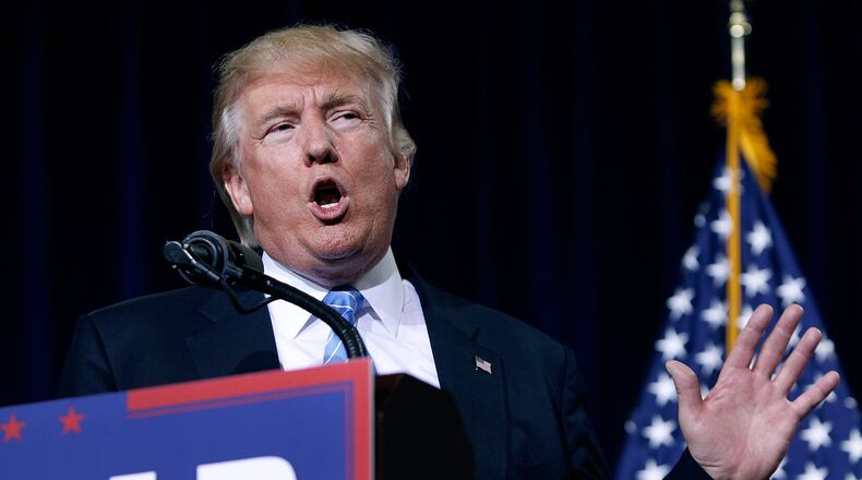 PHOENIX, AZ - AUGUST 31: Republican presidential candidate Donald Trump speaks to a crowd of supporters about his Immigration Policy during a campaign rally on August 31, 2016 in Phoenix, Arizona. (Photo by Ralph Freso/Getty Images)
