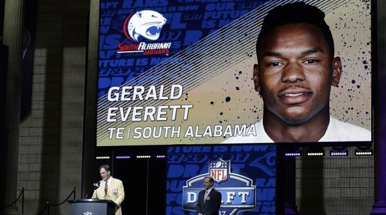 Former Los Angeles Rams player Jack Youngblood, left, announces South Alabama’s Gerald Everett as the Rams’ selection in the second round of the 2017 NFL football draft, Friday, April 28, 2017, in Philadelphia. (AP Photo/Matt Rourke)