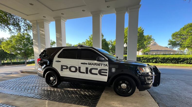 Maj. Patrick Bonito was temporarily suspended after authorities with Marietta police learned he used a racial term about 10 years ago, the chief said.