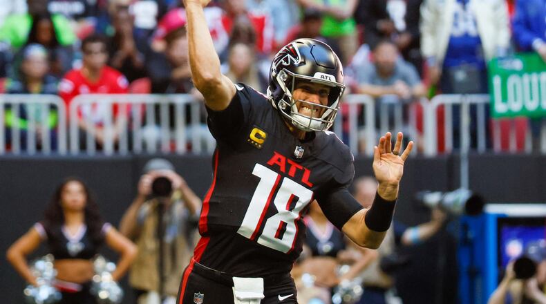 Atlanta Falcons quarterback Kirk Cousins winds back for a pass in the second half of the Falcons' Oct. 20 game against the Seattle Seahawks at Mercedes-Benz Stadium in Atlanta. (Miguel Martinez/AJC)