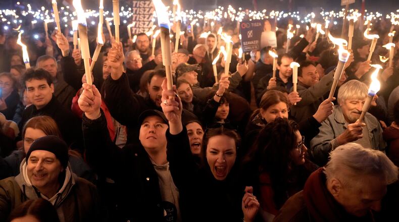 Supporters attend a final election rally of Peter Magyar, the leader of the opposition Tisza party in Debrecen, Hungary, Saturday, April 11, 2026. (AP Photo/Darko Bandic)