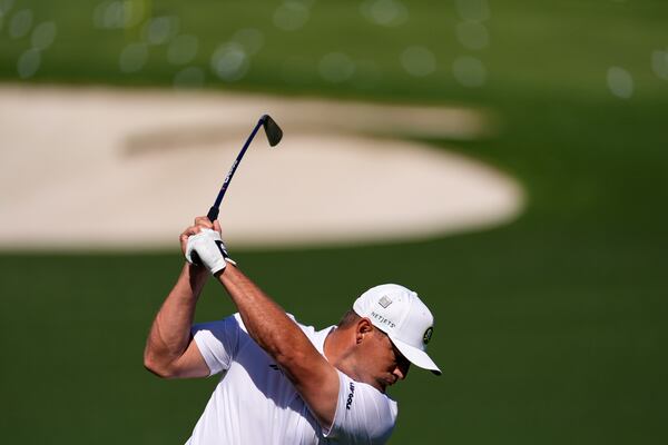 Bryson DeChambeau hits from the driving range during a practice round at the Masters golf tournament, Tuesday, April 8, 2025, in Augusta, Ga. (AP Photo/George Walker IV)