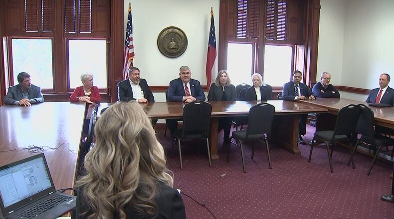 Mark Hennessy (second from right) who was a fake Republican presidential elector, has been appointed by Gov. Brian Kemp to the Board of Natural Resources.