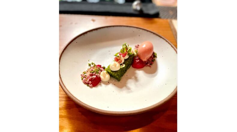 Miller Union's dessert showcase is a basil cake served with rhubarb jam, lime and white chocolate ganache, and guava sorbet. Angela Hansberger for The Atlanta Journal-Constitution