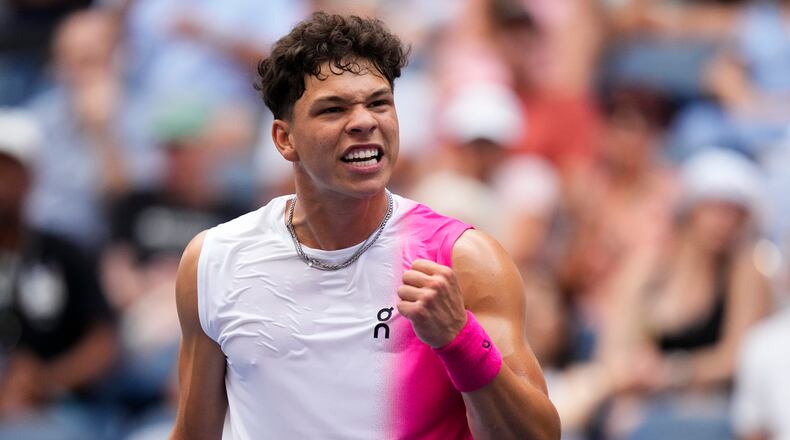 Ben Shelton, of the United States, reacts during a match against Dominic Thiem, of Austria, at the second round of the U.S. Open tennis championships, Wednesday, Aug. 30, 2023, in New York. (AP Photo/Frank Franklin II)