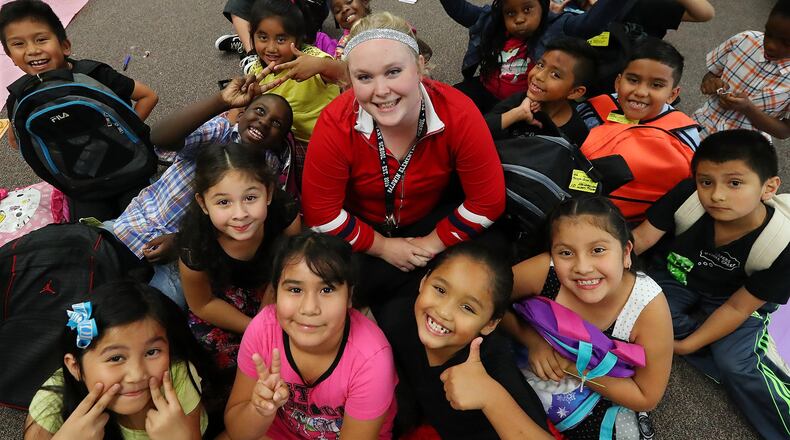 First-year teacher Audrey Smith gathers her students together a final time before lining them up to head to the buses on the last day of school at Baldwin Elementary School on Wednesday, May 24, 2017, in Norcross. Curtis Compton/ccompton@ajc.com