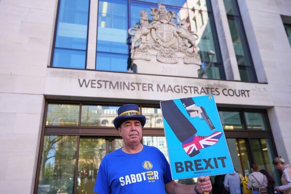 Anti-Brexit campaigner Steve Bray poses as he arrives at Westminster Magistrates Court in London, Monday, April 14, 2025. (AP Photo/Kirsty Wigglesworth)