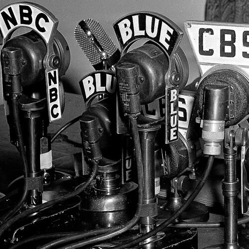 FILE - Network microphones on the desk as President Franklin D. Roosevelt addresses the nation from the White House in Washington on April 28, 1942. (AP Photo/File)