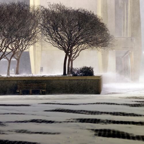 Fans leave in the snow from the ice hockey game between the Norfolk Admirals and the Trois-Rivières Lions at Scope Arena in Norfolk, Va., on Saturday, Jan. 31, 2026. (Peter Casey/The Virginian-Pilot via AP)