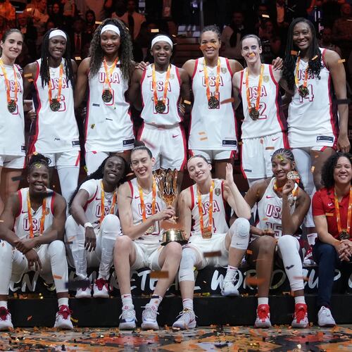 United States plyers pose on the podium after winning the Women's Basketball World Cup final match between the United States and France in Berlin, Sunday, Sept. 13, 2026. (AP Photo/Ebrahim Noroozi)