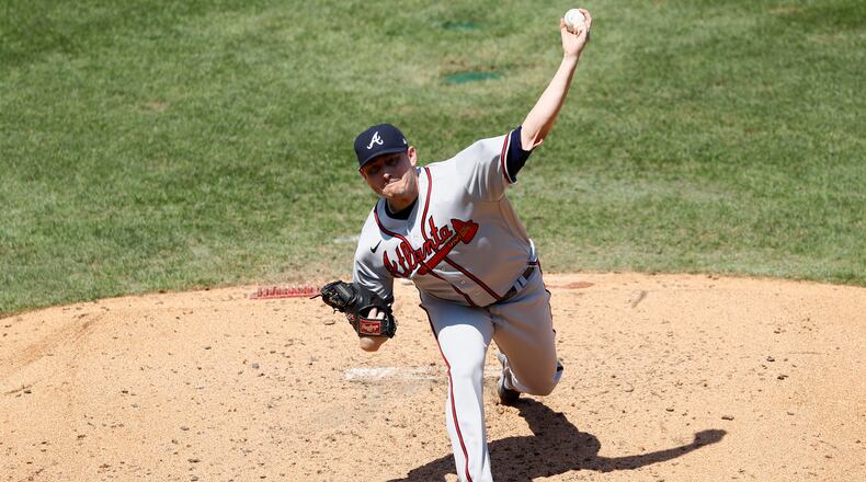 Atlanta Braves' Tyler Matzek pitches during the third inning of the first baseball game in a doubleheader against the Philadelphia Phillies, Sunday, Aug. 9, 2020, in Philadelphia. (AP Photo/Matt Slocum)