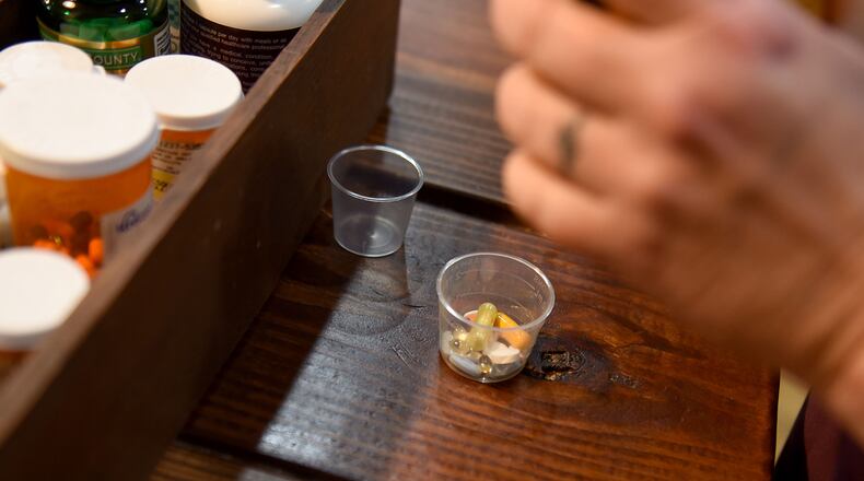 (File photo) House Bill 1351 would remove the function of Georgia's three managed care companies — Peach State, Amerigroup and CareSource — to oversee the dispensing of medication, instead placing it under state supervision. Ryon Horne/RHORNE@AJC.COM