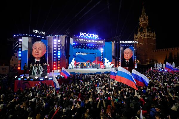 FILE - Russian President Vladimir Putin is seen on a screen as he attends a concert in Red Square in Moscow, on March 18, 2024, marking the 10th anniversary of Russia’s annexation of Crimea. (AP Photo/Alexander Zemlianichenko, File)
