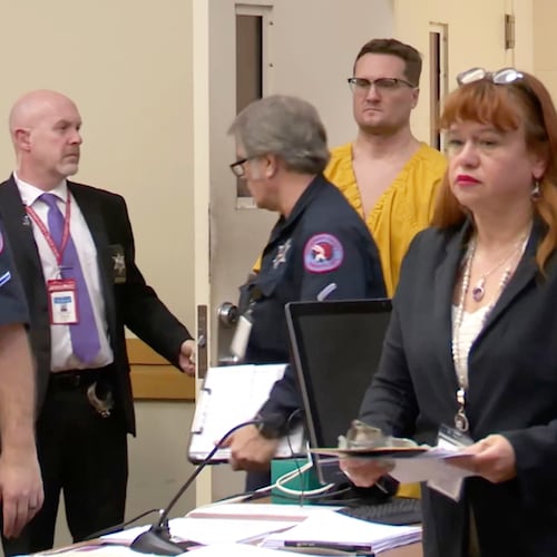 This image taken from video shows Michael David McKee walking into the courtroom on Monday, Jan. 12, 2026, in Rockford, Ill. (WIFR News/Pool Photo via AP)