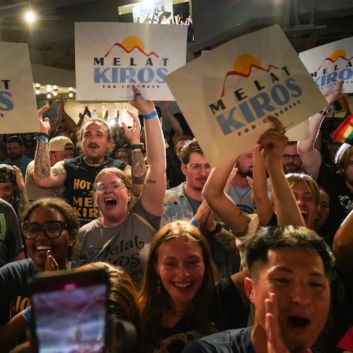 Attendees celebrate after Democratic congressional candidate Melat Kiros won the Democratic nomination during a primary election night watch party at The Broadway, Tuesday, June 30, 2026, in Denver. (AP Photo/Rebecca Slezak)