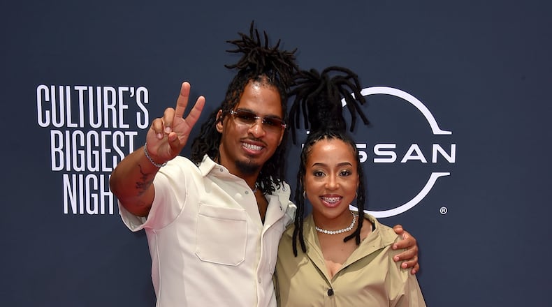 Keith Lee (left) and his wife, Ronni Lee, arrive at the BET Awards on Sunday, June 25, 2023, at the Microsoft Theater in Los Angeles. The food influencer and former MMA fighter recently visited a restaurant in Warner Robins named Tacos y Mariscos Ofelia. (Jordan Strauss/Invision/AP 2023)