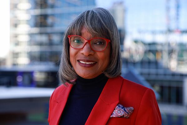 DeRetta Rhodes, executive vice president and chief people & culture officer of the Atlanta Braves, poses for a portrait at Truist Park. (Natrice Miller/AJC)