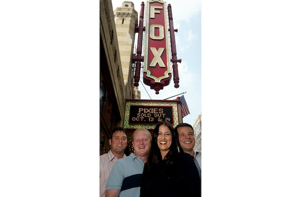 Brandon Mize, Tom Cook, Lucy Lawler and Josh Antenucci of Rival Entertainment in front of the Fox Theatre in 2004 PHIL SKINNER/ AJC