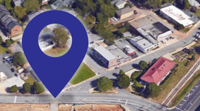 Arrow points to where a new fire hydrant will be installed in front of the ARLO apartments (still unbuilt when this photo was taken). The spot is between the fire station to the left and the old train depot, now the Kimball House, to the right. The east bound lane, toward the railroad tracks to the right, will be closed for about a week. Courtesy city of Decatur.