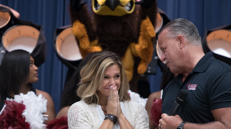 Cindy Wadsworth, center, a third-grade teacher at Kemp Elementary School, has been named the Cobb County School District's 2019-2020 Teacher of the Year.