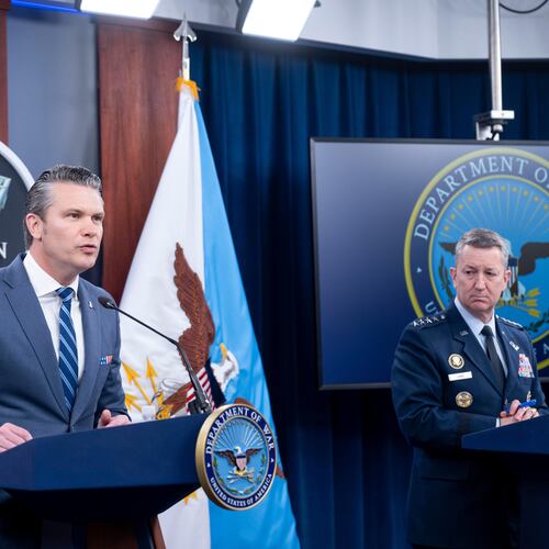 Defense Secretary Pete Hegseth and Chairman of the Joint Chiefs of Staff Gen. Dan Caine speaks to members of the media during a press briefing at the Pentagon, Thursday, April 16, 2026 in Washington. (AP Photo/Kevin Wolf)