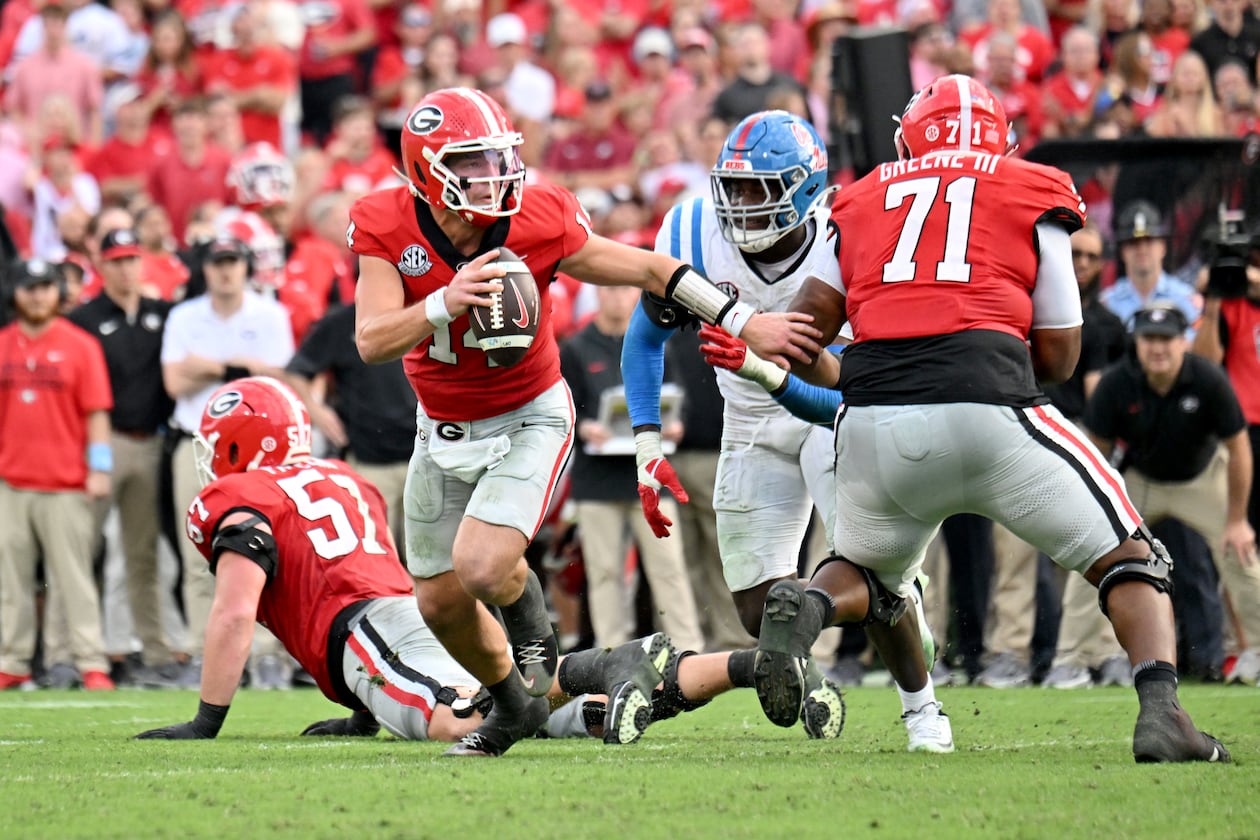 Georgia quarterback Gunner Stockton had to help carry his team to a win over Ole Miss and that's what he did on Saturday, continuing to score points when the defense struggled to get stops. (Hyosub Shin/AJC)