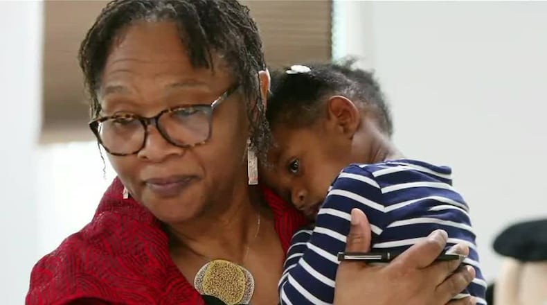 Wanda Irving holds her granddaughter, Soleil, at their home in Sandy Springs. Soleil's mother, Shalon Irving, died three weeks after giving birth.