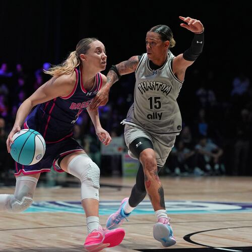 Breeze BC guard Paige Bueckers (5) drives forward defended by Phantom BC wing Natasha Cloud (15) in their Unrivaled 3-on-3 basketball game, Monday, Jan. 5, 2026, in Medley, Fla. (AP Photo/Rebecca Blackwell)