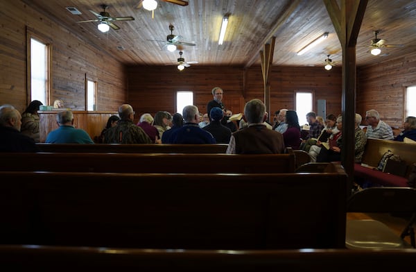 Matt Hinton, a shape-note singer, leads a song at a Sacred Harp singing event held at Holly Springs Primitive Baptist Church in Bremen, Ga., on Saturday, March 22, 2025. (AP Photo/Jessie Wardarski)
