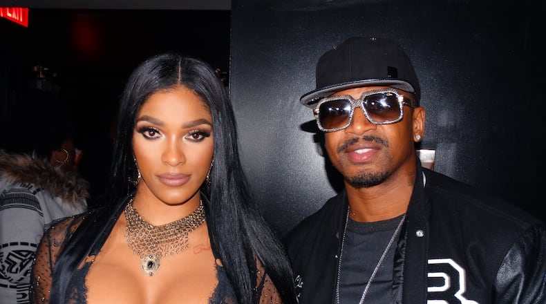 Joseline Hernandez and Stevie J at the "Growing Up Hip Hop" party. They had their own security guard to keep the flim flam away. CREDIT: Rodney Ho/rho@ajc.com