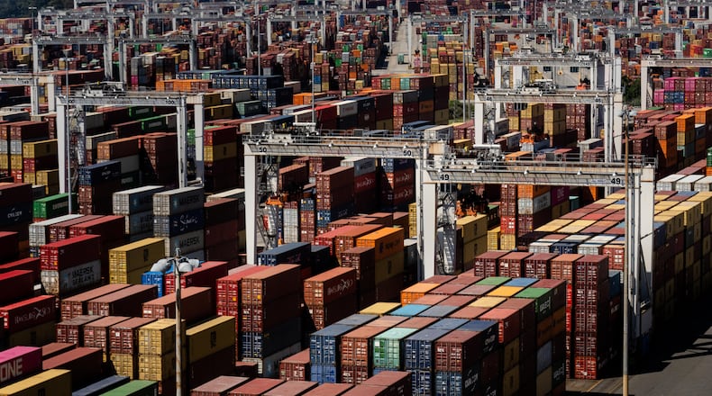 FILE — Shipping containers at the Port of Savannah, in Garden City, Ga., Sept. 29, 2021. Some major retailers are turning towards East Coast ports like this one to avoid potential upheaval at West Coast ports during new contract negotiations for their dockworkers. (Erin Schaff/The New York Times)