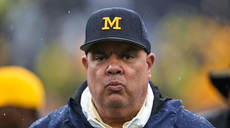 FILE - Michigan athletic director Warde Manuel watches against Indiana in the second half of an NCAA college football game in Ann Arbor, Mich., Oct. 14, 2023. (AP Photo/Paul Sancya, File)