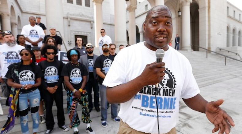Bruce Carter, founder of "Black Men for Bernie," talks to supporters in front of Los Angeles City Hall on Friday, June 3, 2016. (Al Seib/Los Angeles Times/TNS)