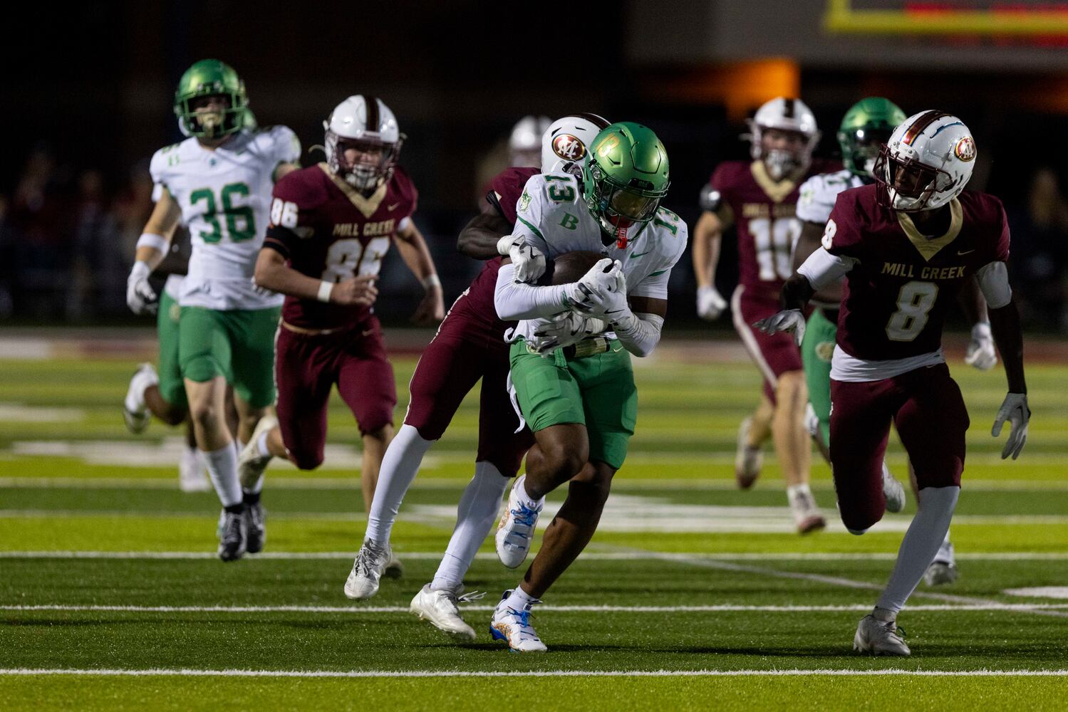 Buford’s Tyriq Green (13) gains yards against Mill Creek. (Photo/Jenn Finch, AJC)