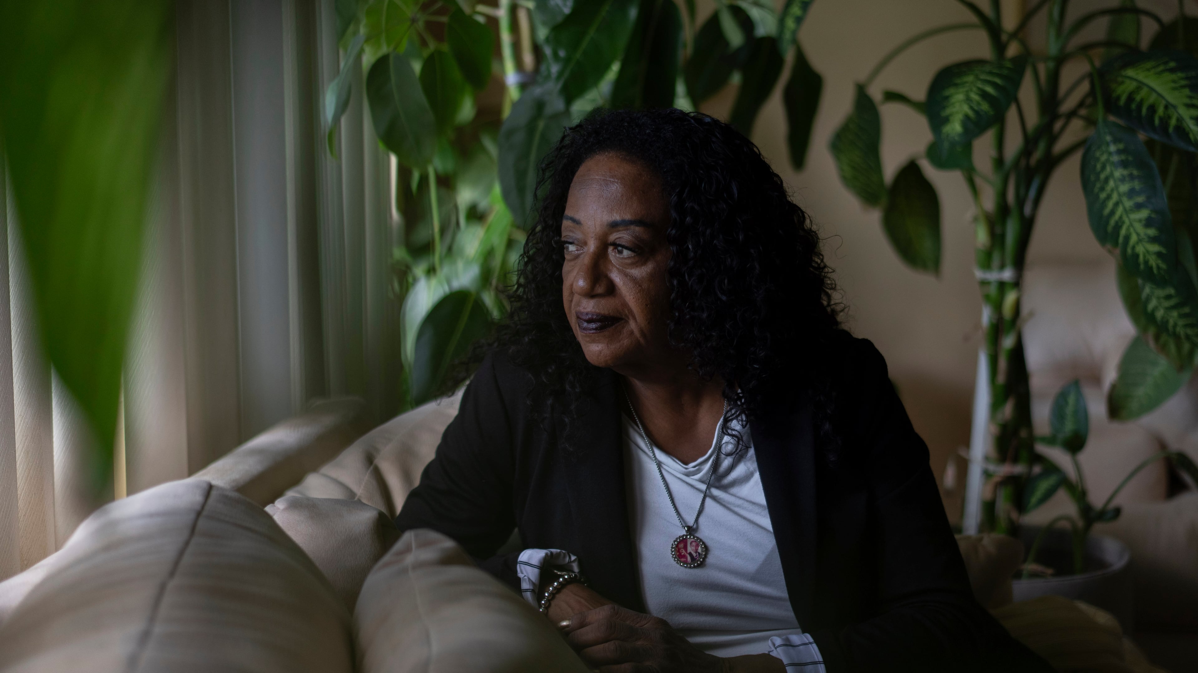 Delphine Cherry looks out from her favorite spot in her home Friday, Sept. 5, 2025, in Hazel Crest, Ill. (AP Photo/Carolyn Kaster)