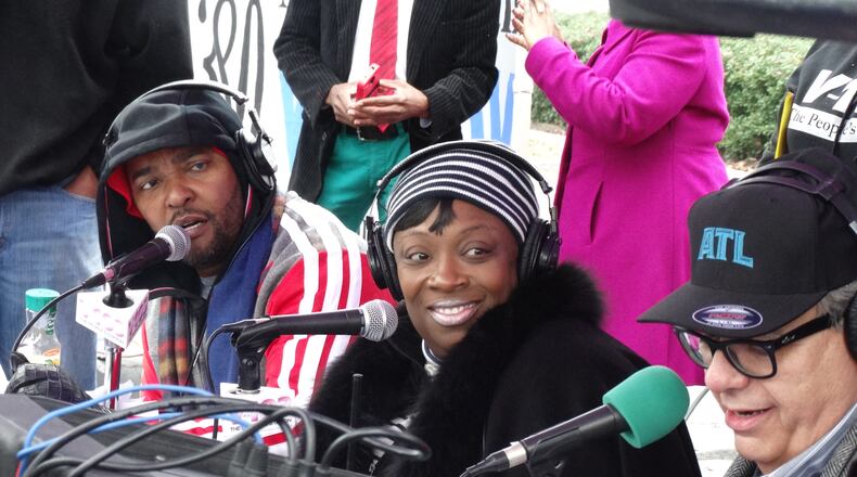 Ryan Cameron, Wanda Smith and Jim Basile at the 11 Alive Can-A-Thon in 2014. CREDIT: Rodney Ho/rho@ajc.com