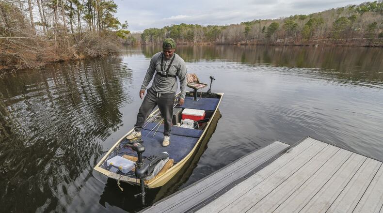 Nick Simmons loves fishing so much, he'll spend a January day in 30-degree weather for the thrill of reeling in a bass. Simmons did not have to shiver in the cold Wednesday, when temperatures soared near 70 degrees in parts of metro Atlanta -- perfect weather for Simmons' trip to Stone Mountain Lake. JOHN SPINK / JSPINK@AJC.COM