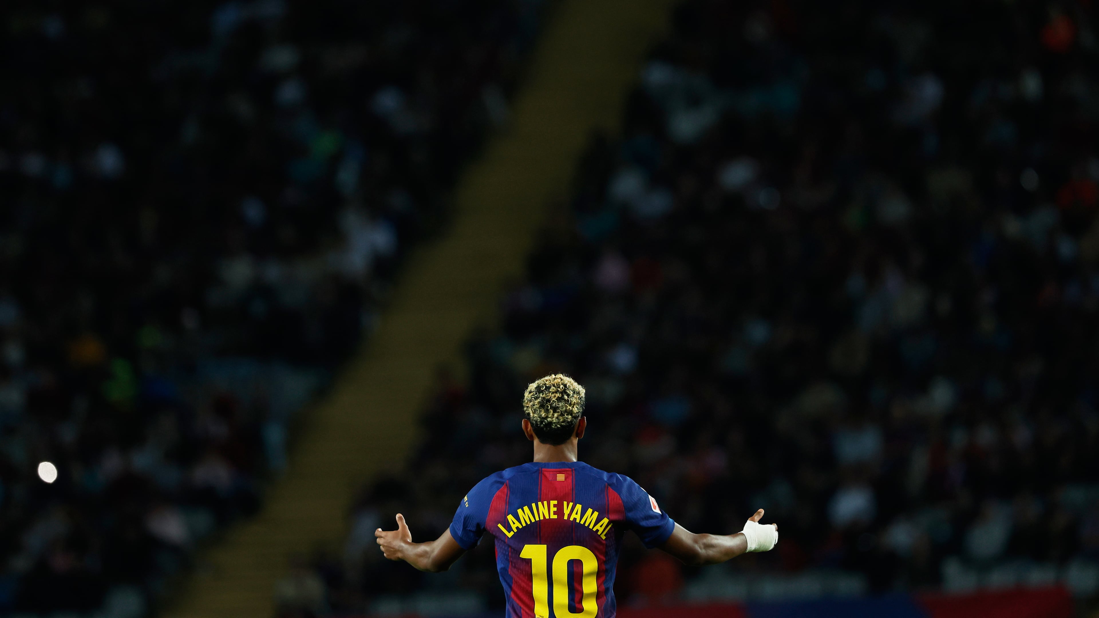 Barcelona's Lamine Yamal reacts during a Spanish La Liga soccer match between FC Barcelona and Real Sociedad at the Lluis Companys Olympic Stadium in Barcelona, Spain, Sunday, Sept. 28, 2025. (AP Photo/Joan Monfort)