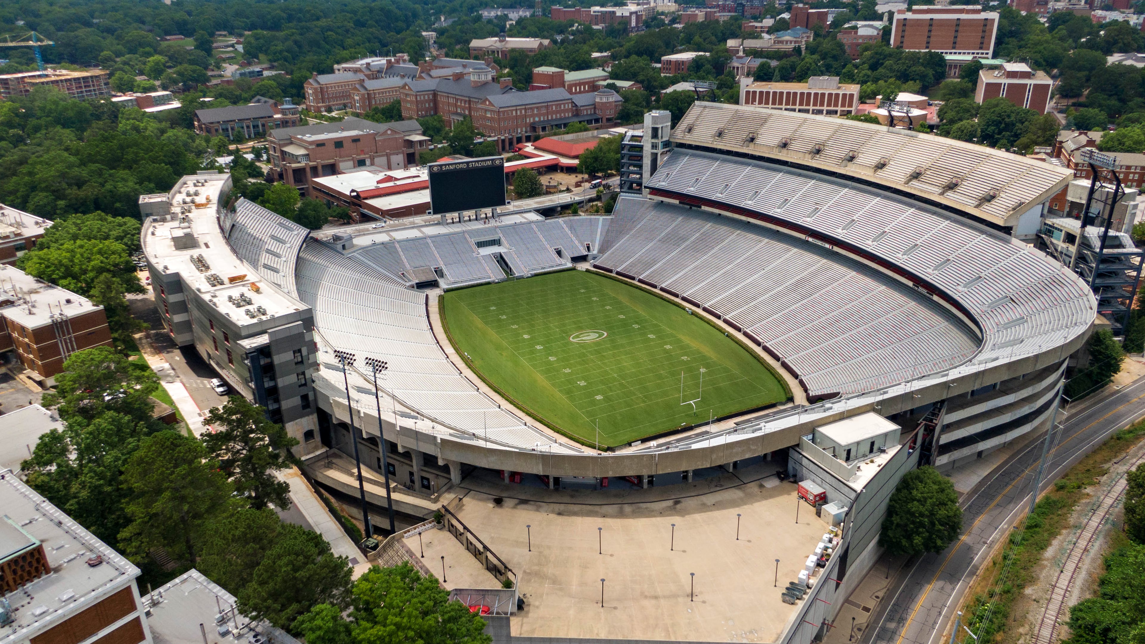 Aerial photo shows Sanford Stadium at the University of Georgia in Athens on June 11, 2021. (Hyosub Shin/AJC)