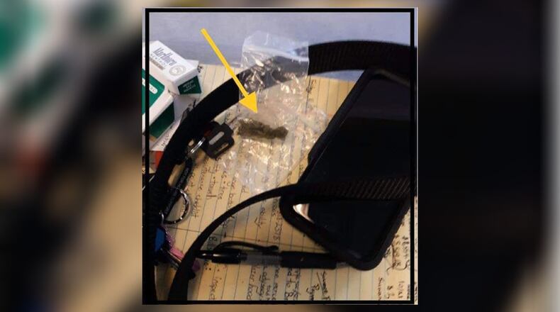 A man walked into a Duluth court Thursday with marijuana in his bag, according to a police report.