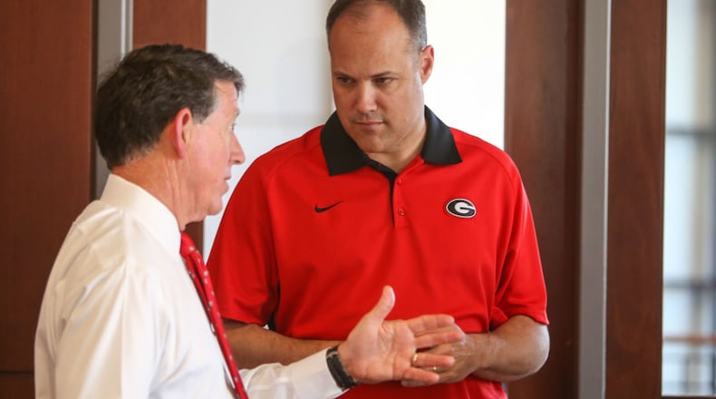 Georgia athletic director Greg McGarity pushed the button on football coach Mark Richt’s firing after the 2015 season but has given basketball coach Mark Fox at least one more season. (Photo by Randy Schafer)